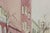 Pastel watercolour depicting a gated courtyard signed Henry L?& dated March 16, (19)84 LR & 'Pour David Noakes qui anime...