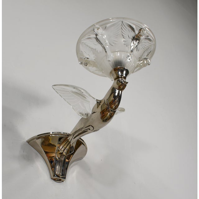 Jean Boris Lacroix A beautiful pair of French art deco wall sconces made around 1935 in nickel plated solid brass or...
