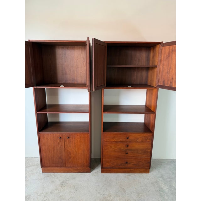 An exceptional pair of 1960s Mid-Century Modern storage cabinets designed by Jack Cartwright for Founders Furniture....
