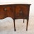 A handsome mahogany serpentine front sideboard in the Sheraton style, dating to the late 19th century, circa 1890 The...