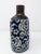 This blue and white unglazed finish vase is perfect for a small bud or as a stand-alone piece. This vase is not only...