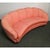 Curved peach velvet sofa. The backrest enriches the quality due to its sinuous shape. Three-seater sofa designed by Giò...