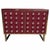Burgundy cabinetry gives this Italian dry bar a rich, contemporary backdrop for forty clear Murano glass spheres. The...