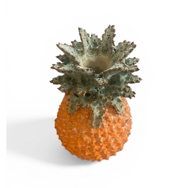 Add a touch of vibrant Mediterranean charm to your home with this striking vintage Italian ceramic candleholder. Expertly...