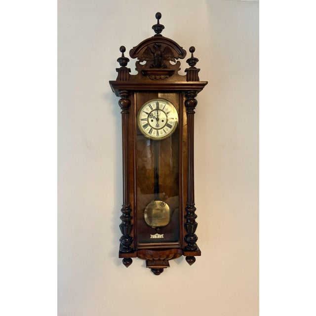 Outstanding quality antique 19th century carved walnut wall clock, having a quality carved walnut case with reeded turned...