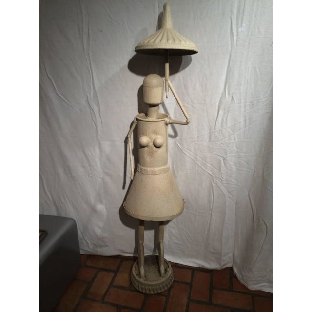 Mid Century Modern 5 Ft Sculpture By Sculptor Jon Westberg. This stunning Industrial sculpture of a woman with umbrella is...