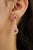 These elegant chandelier drop earrings feature 1.71 carats of natural rubies set in 14K Yellow gold. The ruby measuring...
