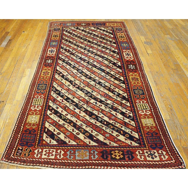 Antique Caucasian rug, measures: 3'9" x 8'3".
