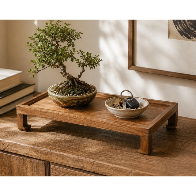 Elevate your favorite décor with this beautiful vintage Mid Century Modern wooden riser tray. Crafted from richly grained...