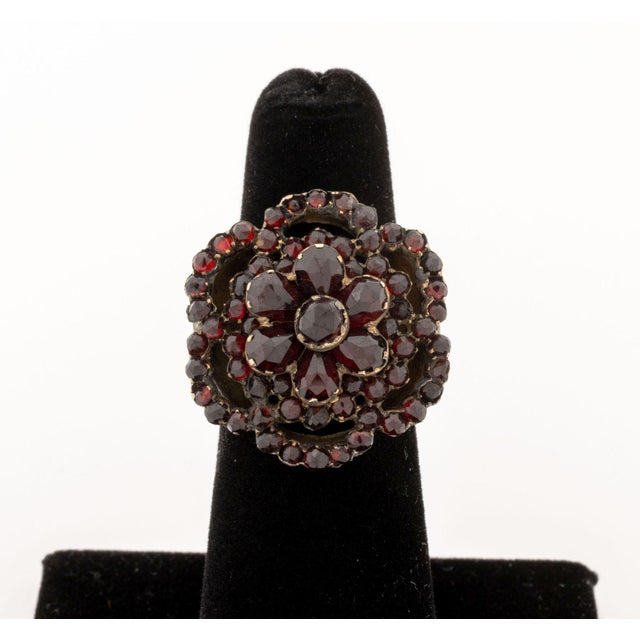 Victorian 14K Yellow Gold, Sterling Silver, and Garnet Cluster Ring, designed with 14K yellow gold shank and sterling...