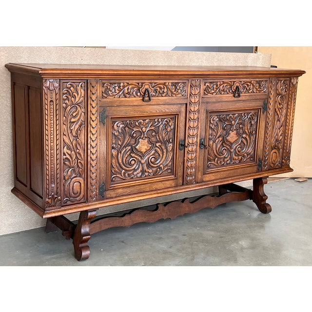 19th century Catalan Spanish buffet with two carved drawers and two doors. Details Dimensions Height: 43.9 in. (111.5 cm)...