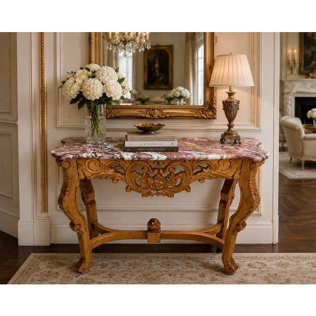 Elevate your interior with this striking vintage Rococo Revival console table, showcasing an exquisite hand-carved...