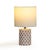 The Merlot Capiz Shell Table Lamp brings a touch of luminous elegance to any space. Hand-placed Capiz shells shimmer...