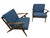 Elevate your living space with this exceptional pair of Mid-Century Danish Modern “Z” arm chairs designed by Poul Jensen...