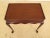 Biggs Queen Anne style mahogany tea table with pull out slides. Features scalloped skirt, Queen Anne legs & pad feet, pull...