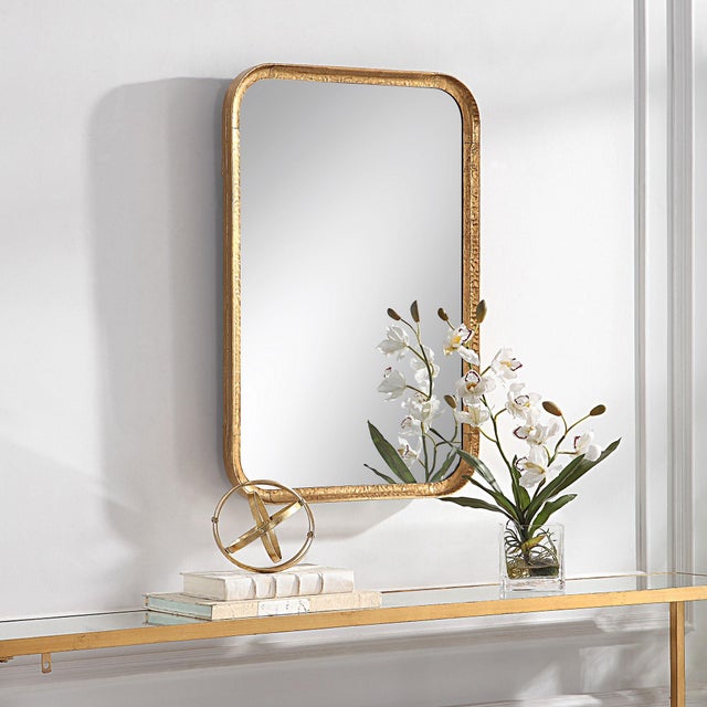 This rectangular shaped frame, made of hammered metal, features a concave surface and radius corners. It is finished in a...