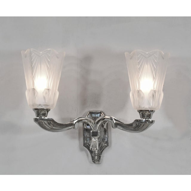 Jean Gauthier A pair of French art deco double wall sconces made circa 1925-1935 in nickel plated solid brass or bronze...