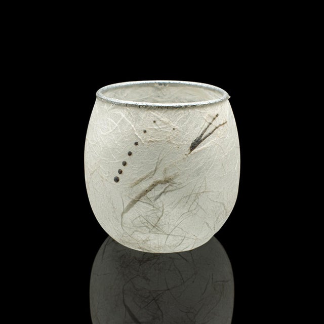 This is a small contemporary tea light jar. An English, straw silk art glass votive or posy vase by Margaret Johnson....