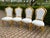 A striking 1970s Italian Baroque / Rococo Revival dining set, featuring a richly carved gilt dining table with a black...