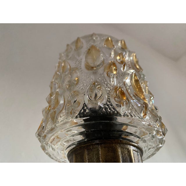 Amber Pressed Glass Table Lamp with Wooden Base, 1970s, in Very Good conditions. Designed 1970 to 1979 This piece is...