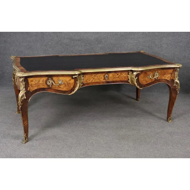 An absolute masterpiece of 19th-century French craftsmanship: a monumental antique Louis XV style bureau plat / executive...