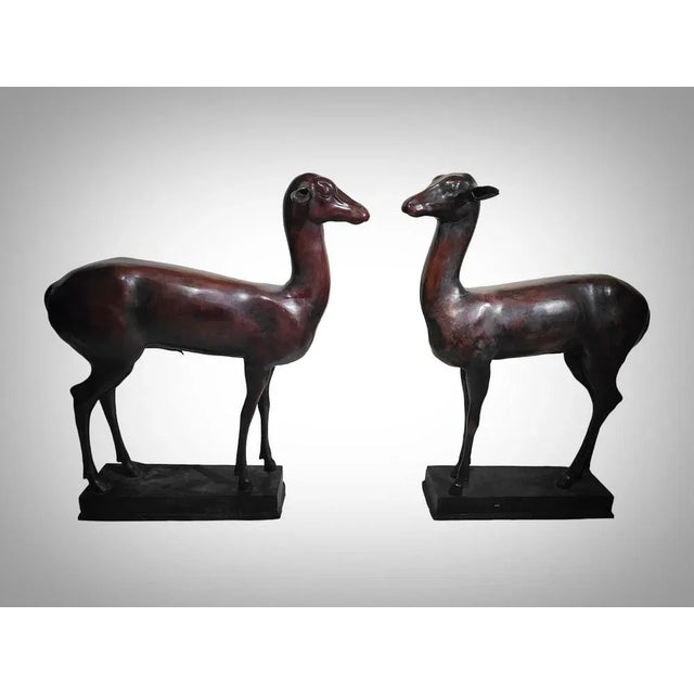 Couple of young deer after ancient times. Patinated bronze. Beginning of the 20th century. This pair of young deer is a...