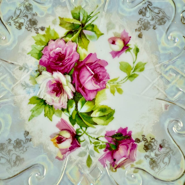 A Large iridescent porcelain rose bowl with pierced handles showing the Green Lion mark of T L Lehmann, Bavaria, circa...