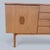 A characterful 1960s mid-century sideboard combining teak with wood-grain Formica. At 151 cm wide it offers excellent...