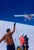 Haute Route Flyby by Toni Frissell A ski plane flies over head a group of skiers partaking in the infamous “Haute Route”,...