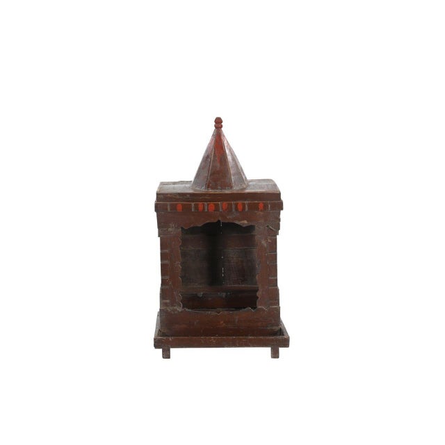 This folky and naive temple is constructed from solid teakwood, featuring an open-sided design, decorative carved details,...