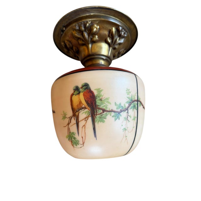 What a charming light fixture! Perfect for any room that needs character. Painted birds and vines in red, blues and greens...