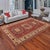 Enhance your home with this exquisite hand-knotted Super Kazak rug, crafted from fine hand-spun wool and dyed with all-...