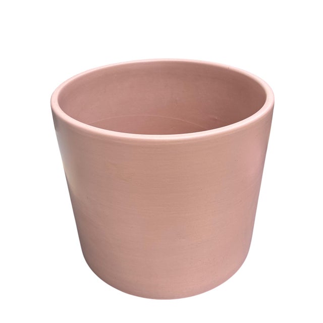 Increasingly rare color and sized iconic Gainey Ceramics planter executed in matte pale pink or “Dusty Rose” glaze circa...