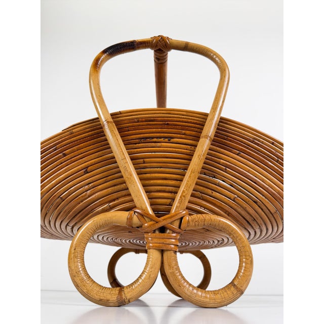 We are pleased to offer for sale an elaborate and refined Mid-Century Modern magazine rack, handcrafted in Italy from...