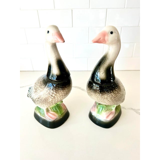 Looking for unique and nostalgic items to flank a mantle or bookcase? This pair of vintage Jim Beam goose decanters have...