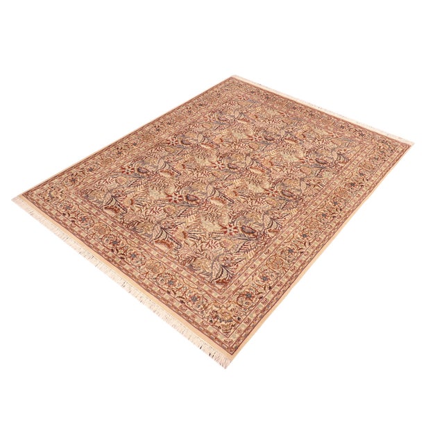 Designed with mesmerizing intricacy and gorgeous color palette, this hand-knotted masterpiece demonstrates the beauty and...