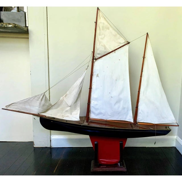 Striking vintage model of a sleek schooner that is artfully handcrafted and finely detailed. The SS Dolores is a schooner...