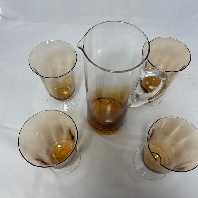 These gorgeous glasses fit in your hand like a dream. Four hand blown amber glass goblets 6.5 “ Tall. With wide almost 4”...