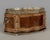 A late 19th century French Napoleon III marquetry jardinière, or cache pot, with inlaid veneers of mahogany and walnut and...