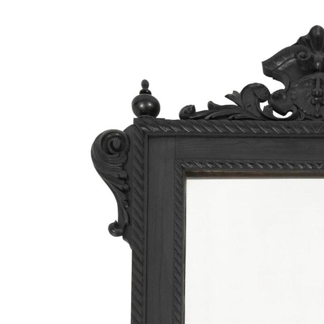 Furniture - Wall mirror. Portuguese, early 20th century, chestnut wood frame with carvings, decorated with vegetal motifs,...