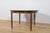 Round extendable table made of rosewood wood, manufactured in Denmark in the 1960s. The table is characterized by...