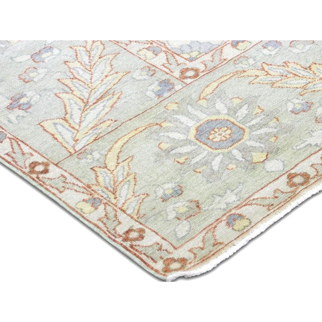 This vintage Egyptian Sultanabad rug was meticulously hand-woven in the Nile delta region of Northern Egypt. Made with...