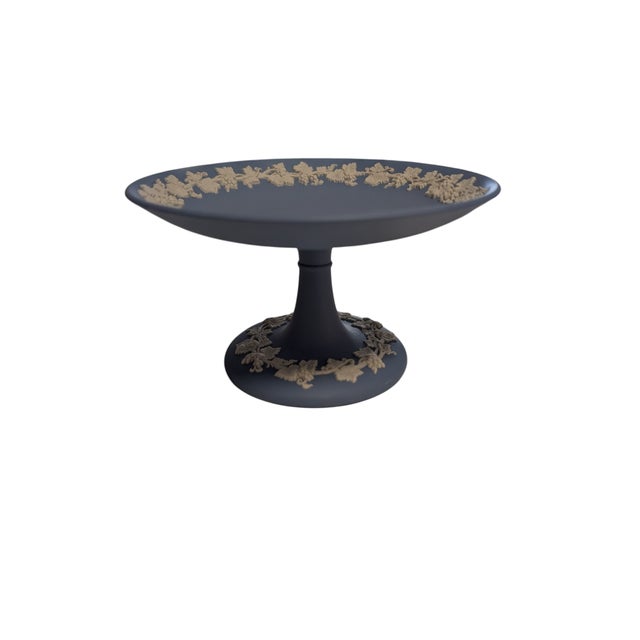 Elevate your collection with this exquisite piece of English craftsmanship. This Wedgwood Blue Jasperware Compote is a...