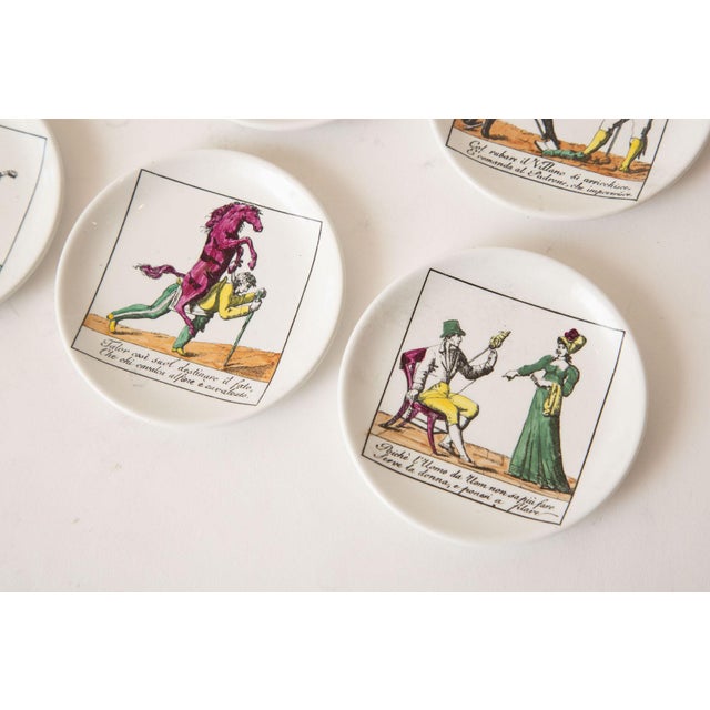 1950s Vintage Piero Fornasetti Porcelain Colored Opera Coasters Il Mondo Alla Rovescia Set of 8 Italian MCM For Sale - Image 5 of 12