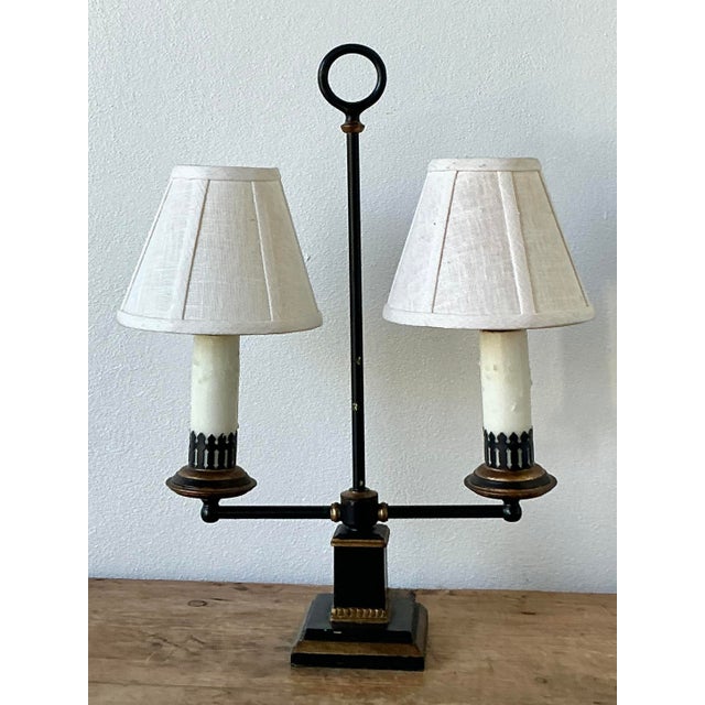 This elegant vintage French Bouillotte-style table lamp embodies Regency sophistication and tailored European charm....