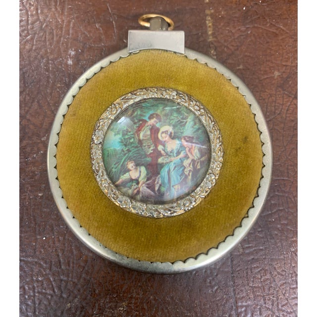 Charming set of antique-to-vintage miniature portrait frames featuring romantic, Victorian-style pastoral scenes. Each...