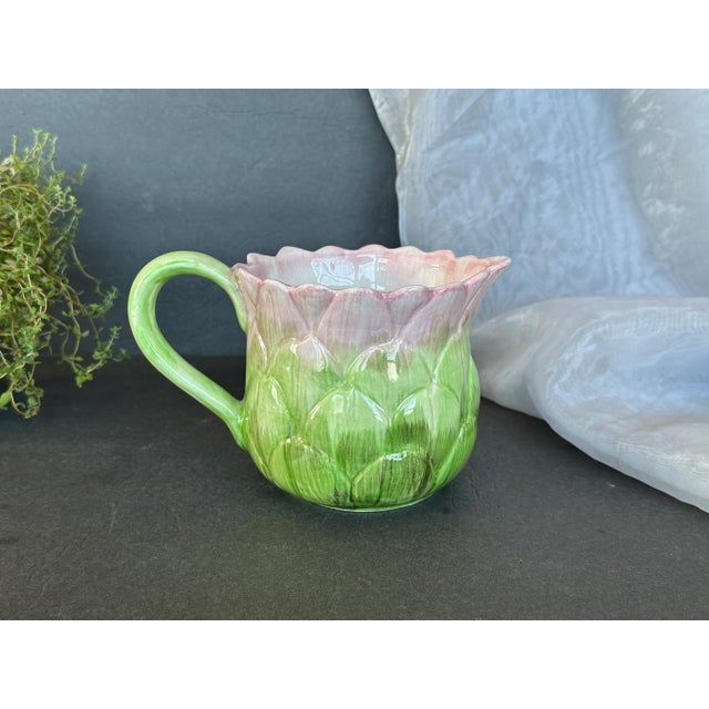 Display this vintage Fitz and Floyd artichoke pitcher on a kitchen hutch or dining room shelf when you are not using it to...