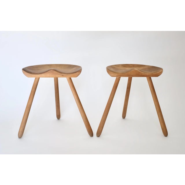 Charming rustic pair of Swedish Vintage stools from the 1940's. Beautiful sculptured shape on the seat with 3 rounded...