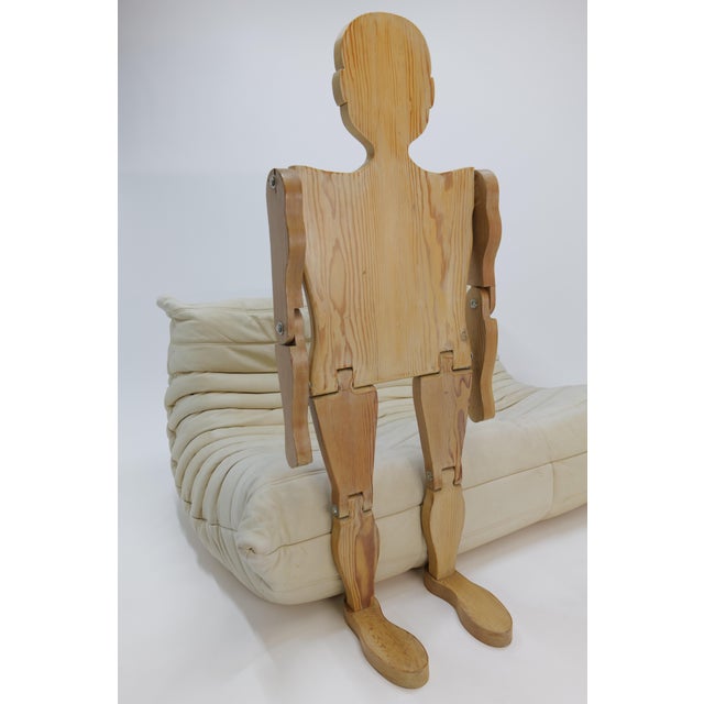 This 50" tall articulating folk art wood figure is a medium sized wooden mannequin designed with lifelike proportions. Its...
