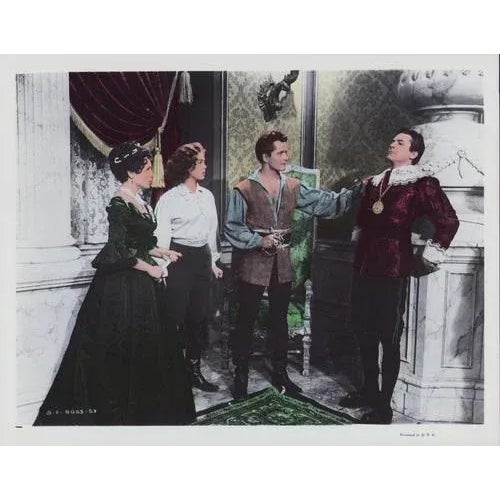 Original lobby card for the film "Prince of Pirates" (1953) featuring John Derek, Barbara Rush, and Carla Balenda. This...